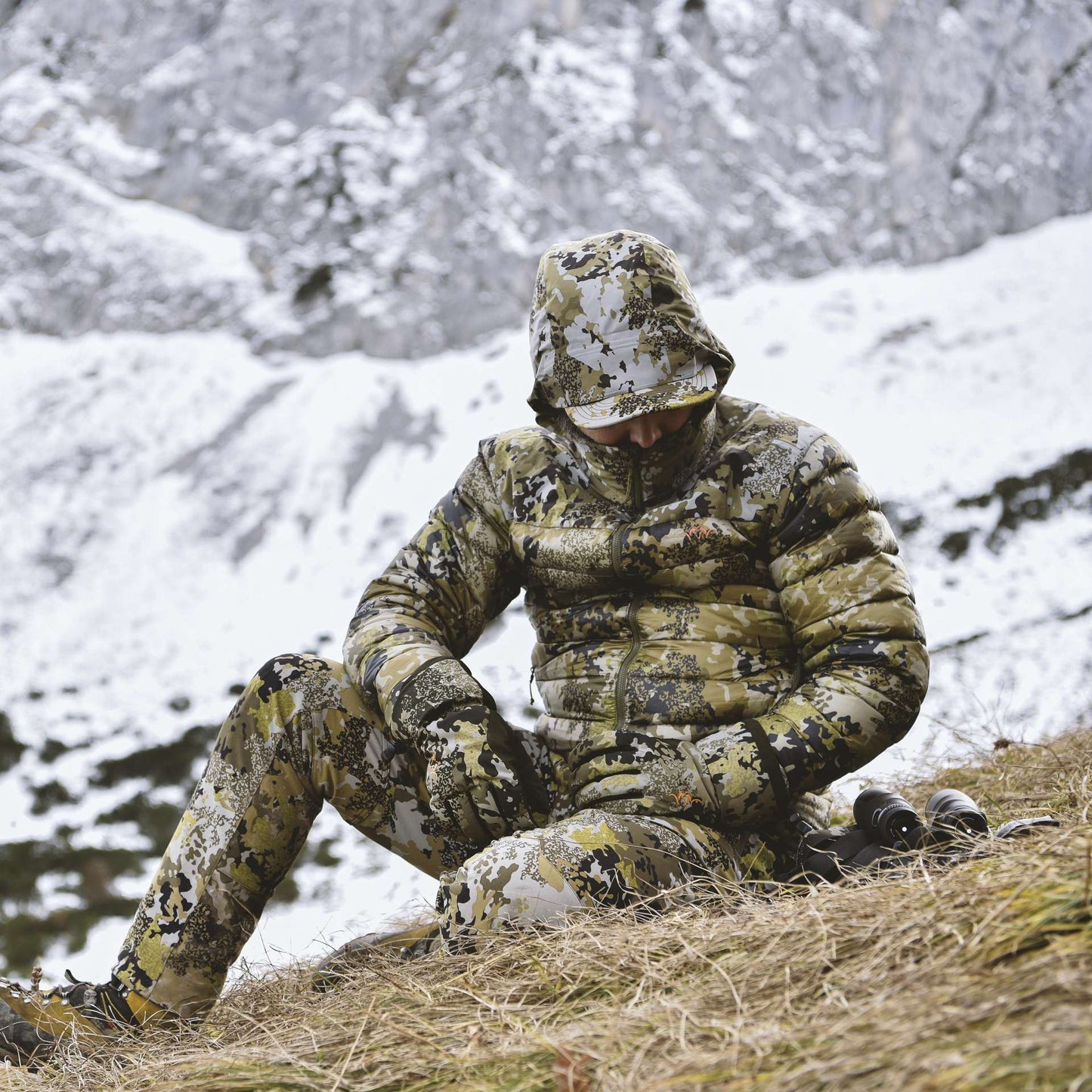 Man wearing a Blaser Down Filled  Camo Jacket