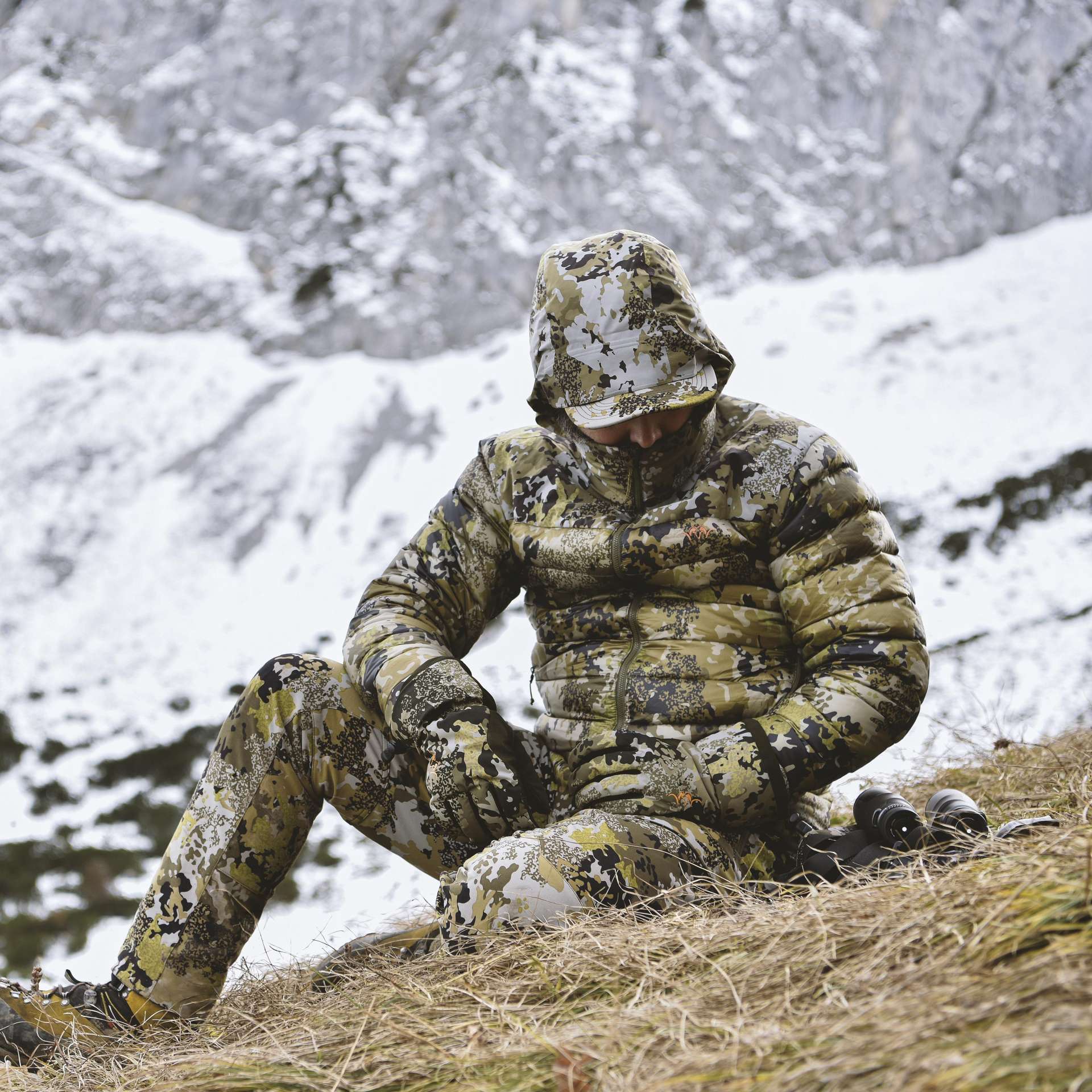 Man wearing a Blaser Down Filled  Camo Jacket